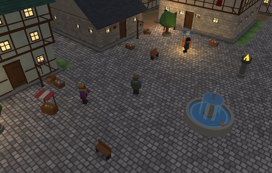 The cobbled square at dusk, with the fountain, a lit lamp and the windows of the houses round it alight